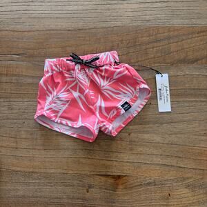 Kids Pink Tropical Swim Trunks with White Leaf Print